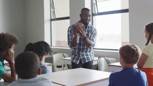 Teacher Explains Brain Model to Attentive Students