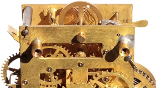 Close Up of the Gears of a Clock