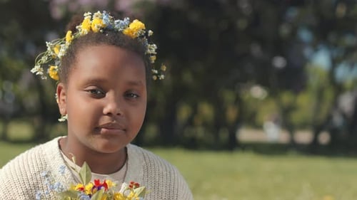 Girl with Flower Crown Holds Colorful Bouquet
