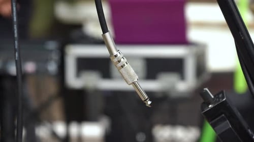 Jack hanging, unplugged from the sound system -Close up