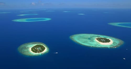 Aerial drone view of scenic tropical islands in the Maldives