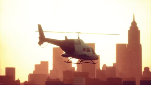 Silhouette-Hubschrauber im Stadtbild-Hintergrund