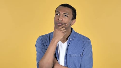 Pensive Man Thinking with Hand on Chin