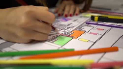 Woman Colors Architectural Design with Colored Pencils