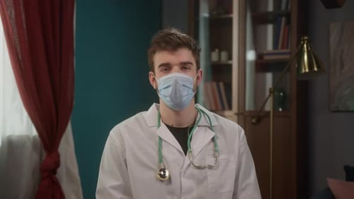 Healthcare Worker Wearing Mask and White Coat