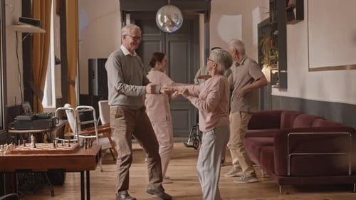 Seniors Dancing Together in Nursing Home