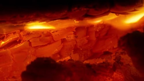 Glowing Embers in Burning Fire