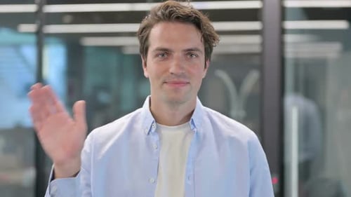 Portrait of Man Waving Welcoming