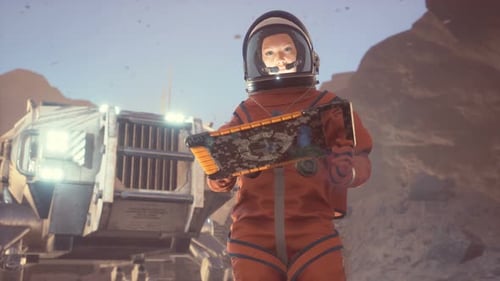 Astronaut Works With A Tablet