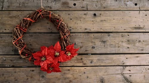 Festive Christmas Wreath on Rustic Wooden Background