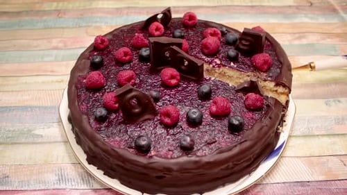 Chocolate Cake with Fresh Berries and Chocolate Decorations