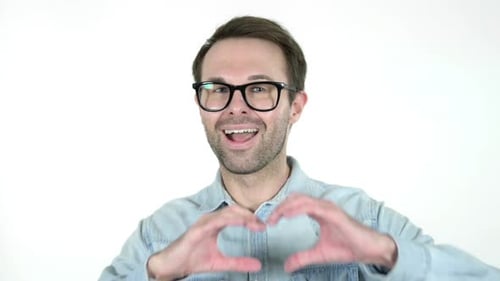 Smiling Man Making Heart Shape with Hands