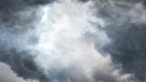 dark and moving cumulonimbus clouds in the sky, a thunderstorm 4k