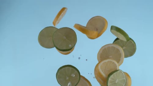 Lime and Lemon Slices Floating in Air
