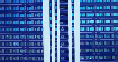 A blue building with windows