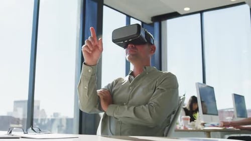 Man Using VR Headset in Bright Office