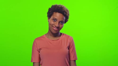 Happy Woman Giving Thumbs Up on Green Screen