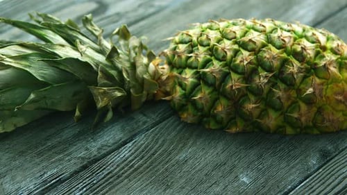 Close Up of Fresh Pineapple on Wood Surface