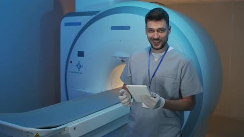 Portrait of Male Radiologist with MRI Machine