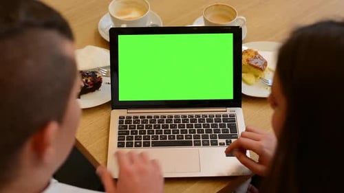 Computer, Notebook, Green Screen, Woman and Man Works on Computer in Cafe, Coffee and Cake