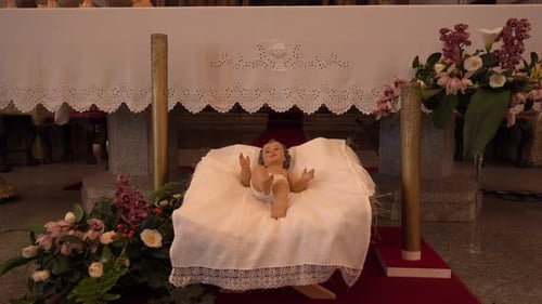 Figurine of Baby Jesus in a Manger