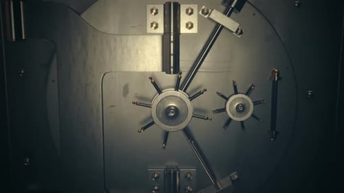 A solid metal gate used by bank to protect and secure all of the stored deposit.