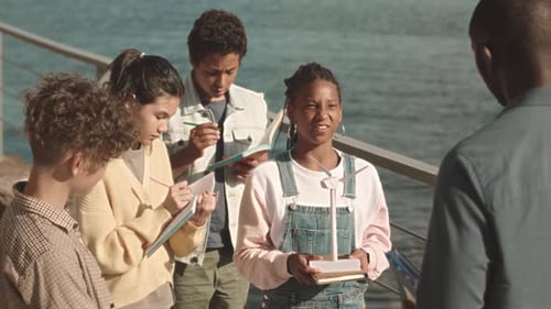 School Kids Studying Alternative Energies Outdoors