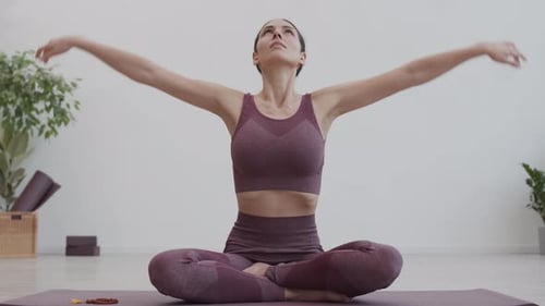Portrait of Young Woman Doing Yoga