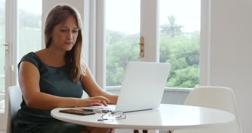 Millennial female professional working in a creative office