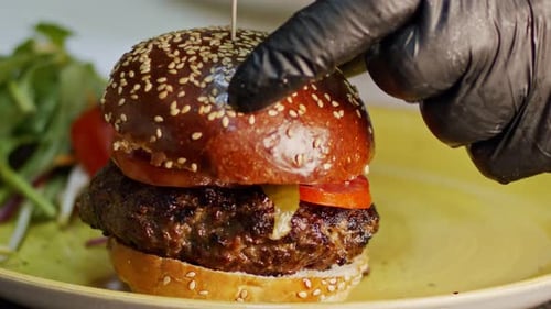 Juicy Burger Assembled and Served on Plate