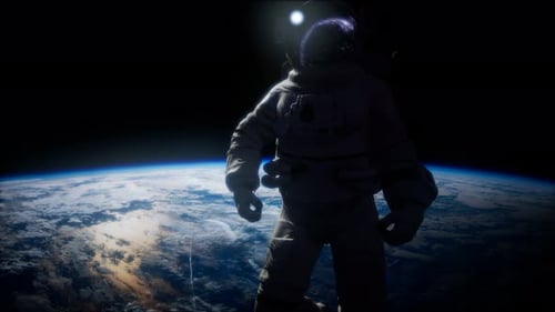Astronaut Standing in Space Looking at Earth