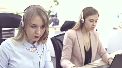 Call Center Agents Speaking with Customer