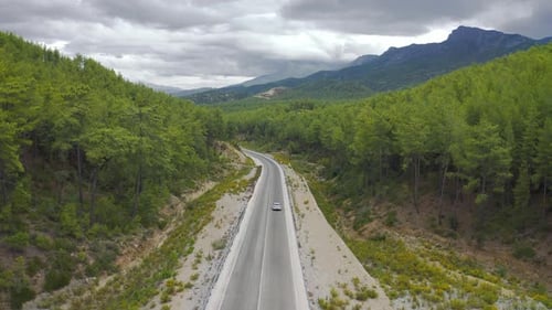 The Car Is Driving on the Mountain Road with Green Forest in Manavgat Antalya Turkey