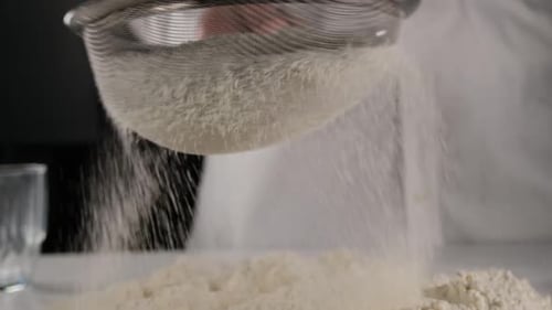 Chef Sifting Flour