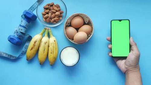 Healthy Food and Exercise Flat Lay with Phone