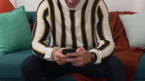 Caucasian man using his phone