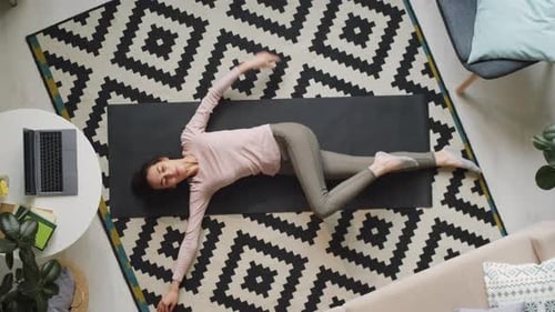 Woman Practicing Yoga at Home, Aerial View