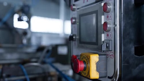 Factory Machine Conveyor Controller with Buttons Showing Production Data Closeup