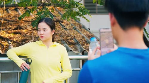 Woman Posing for Photo After Workout in City