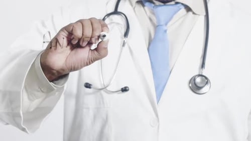 Doctor Writing The Word Anxiety