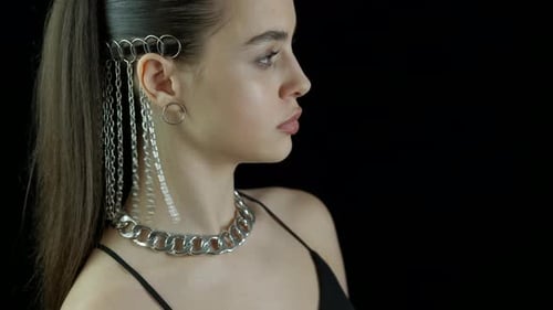 Woman Wearing Silver Rings and Jewelry