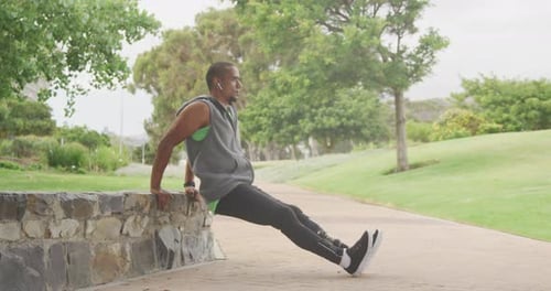 Side view man with prosthetic leg stretching