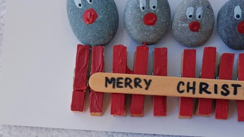 Making Diy Merry Christmas Deer on Greeting Card Postcard Made of Pebbles Sea Stones Clothespins and