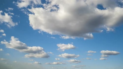 Clouds Floating in a Sunny Blue Sky
