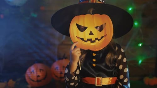 Young Girl Dressed as Witch in Costume
