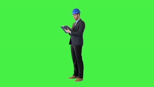 Confident Architect Constructor in Formal Suit and Hardhat Writing Note in Notebook Visiting Project