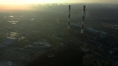 Factory in the City Top View Two Pipes From Which Smoke Comes