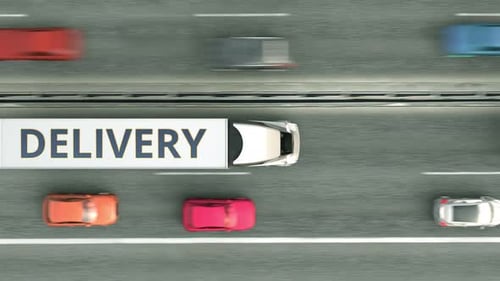Camiones remolques con texto de ENTREGA conduciendo por la carretera