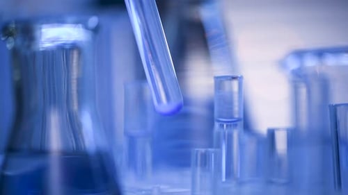 Dropping Liquid in Test Tube During Experiment