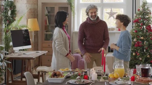 Family Gathers for Christmas Holiday Celebration